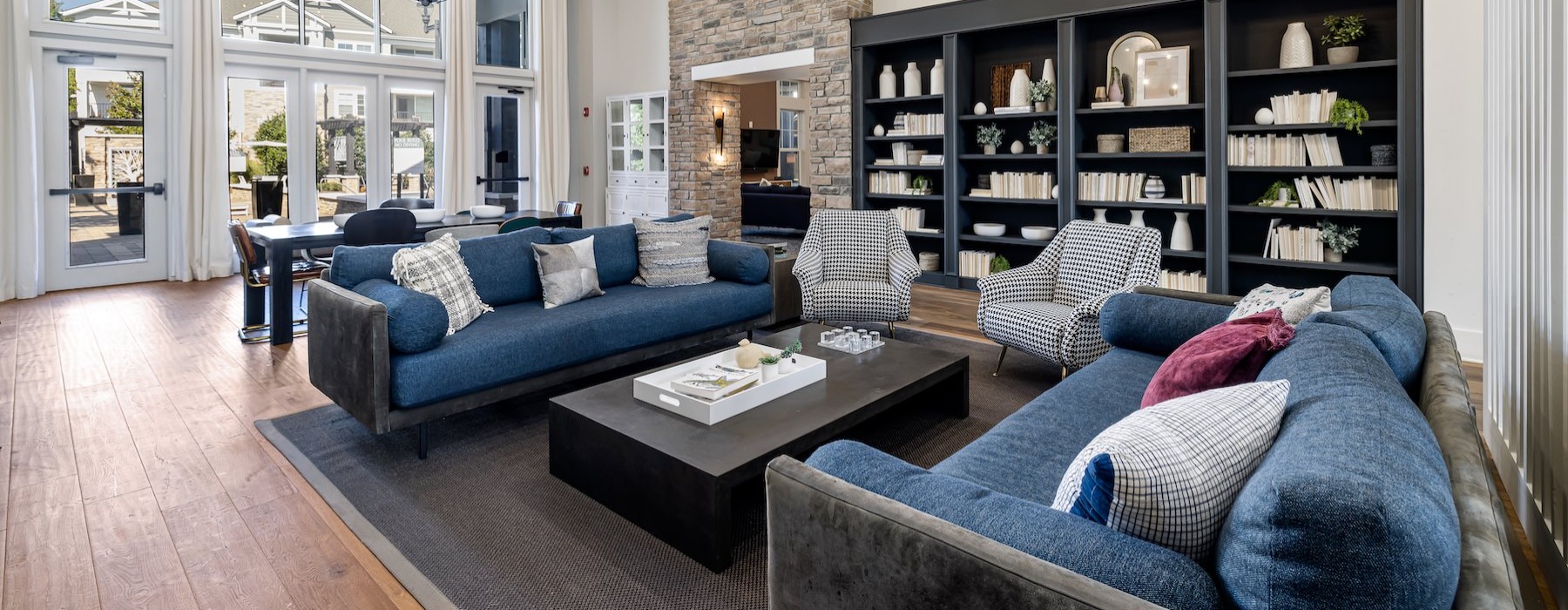 a clubroom with couches and chairs